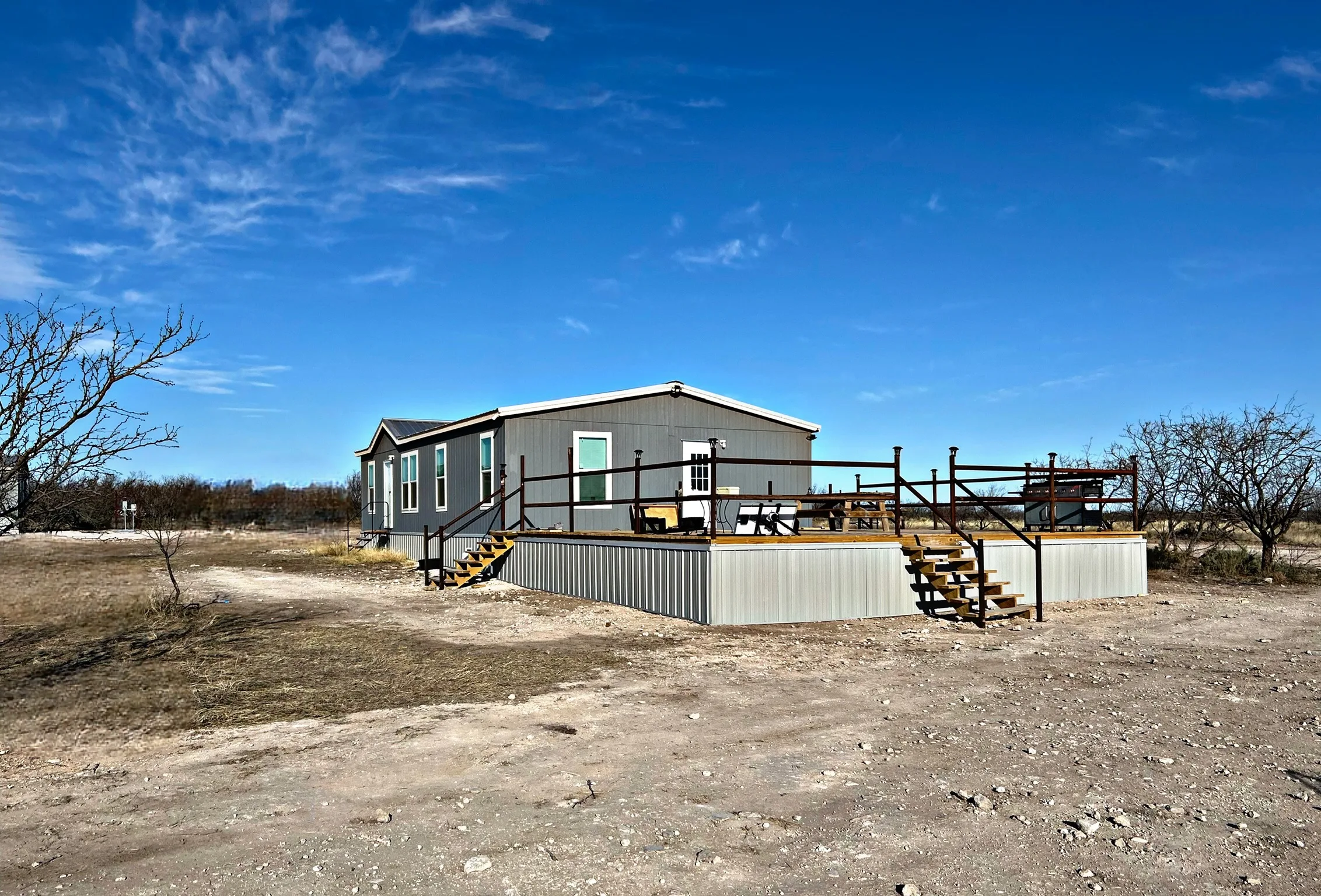 Five Aces Ranch hunting lodge exterior in Millersview, TX