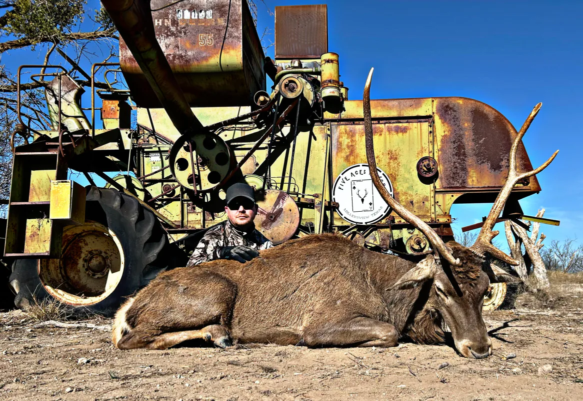 Hunter with trophy blackbuck harvested at Five Aces Ranch in Millersview, TX.