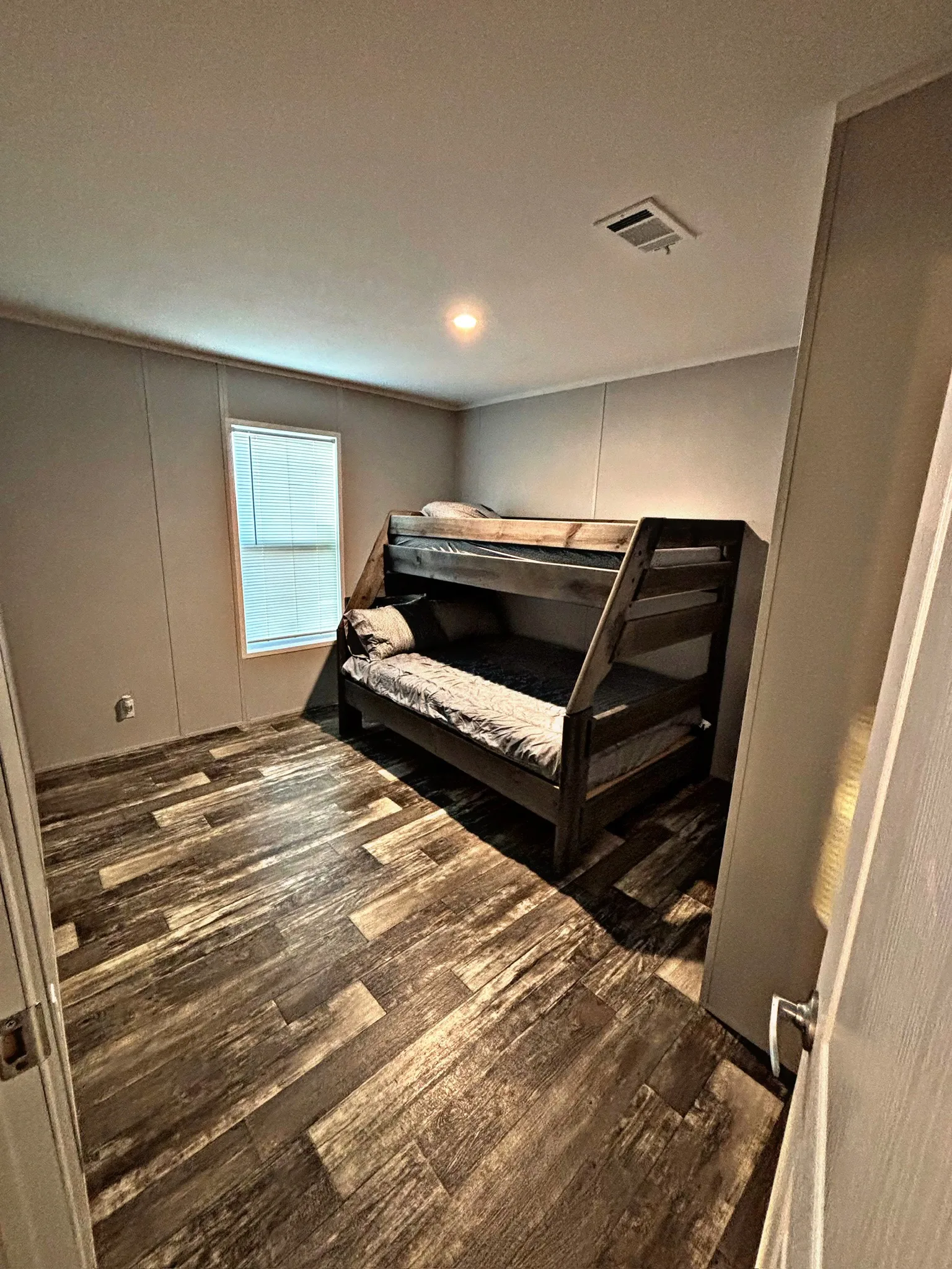Bunkhouse bedroom at the Five Aces Ranch lodge, Concho County TX