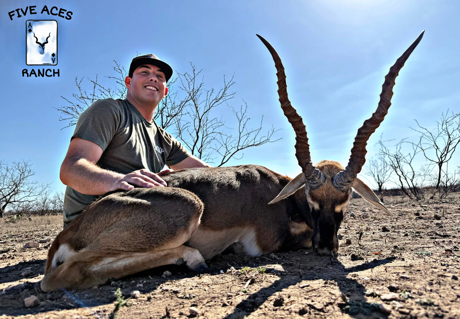 Hunter with trophy blackbuck harvested at Five Aces Ranch in Millersview, TX.