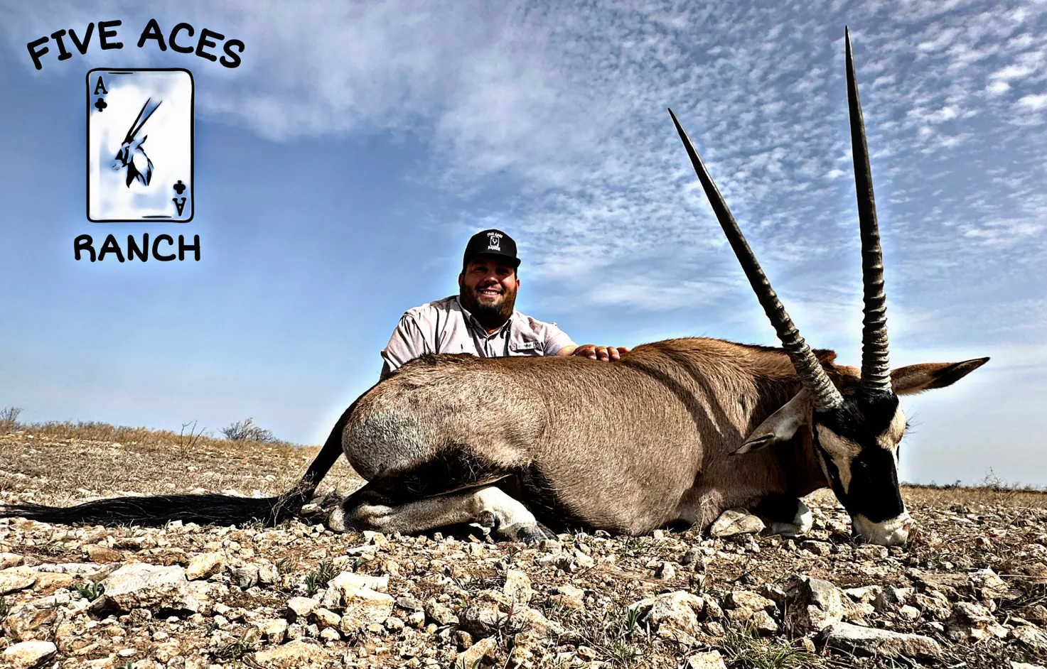 Hunter with trophy scimitar oryx harvested at Five Aces Ranch in Millersview, TX.