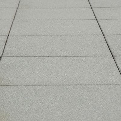 Freshly finished concrete patio with clean lines.