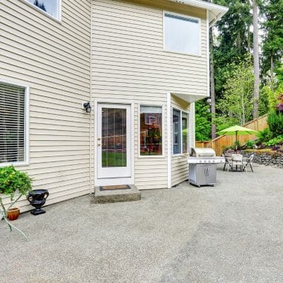 ackyard patio with a smooth concrete surface