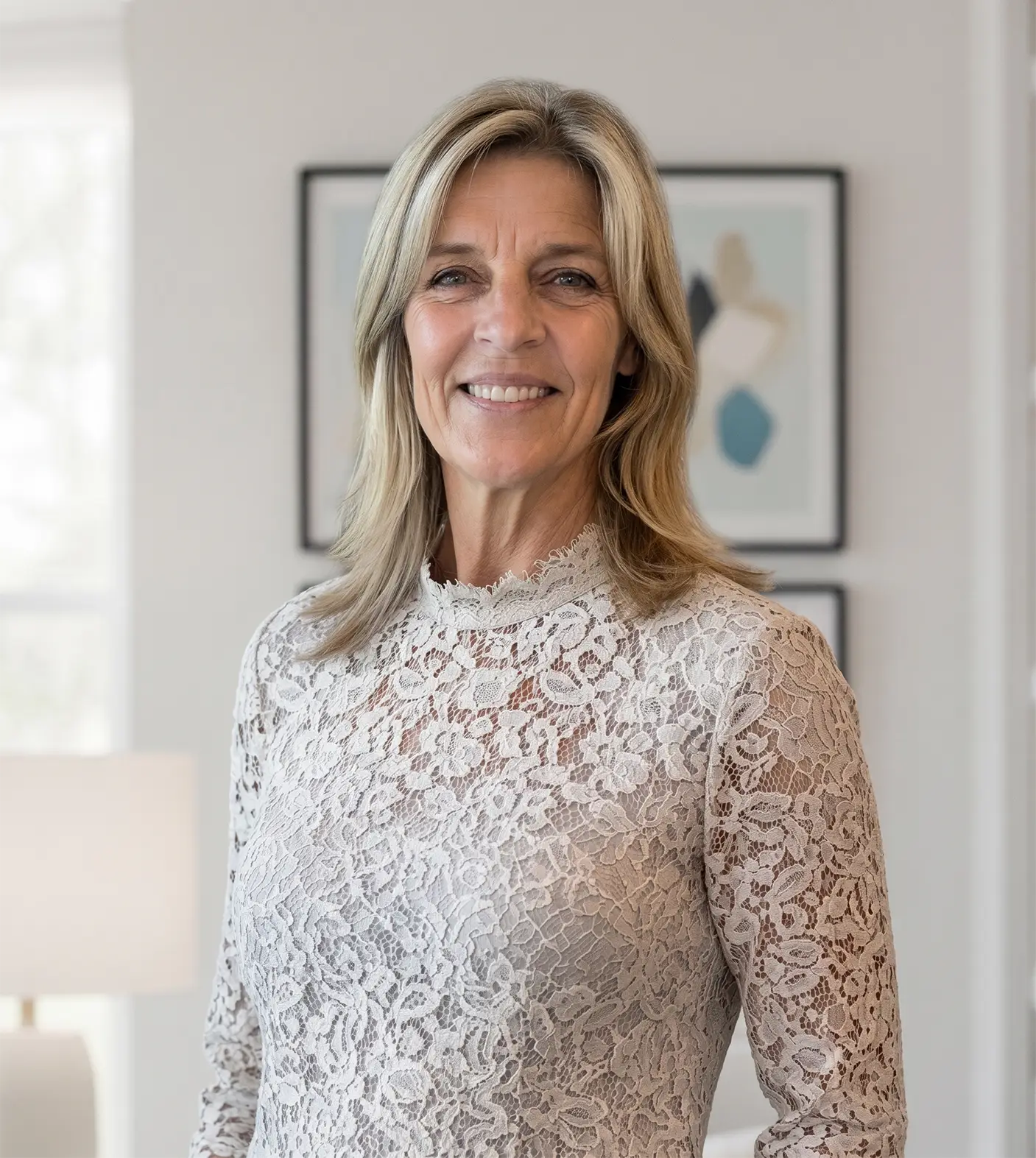 Dr. Jennifer Wilson standing in her light-filled therapy office