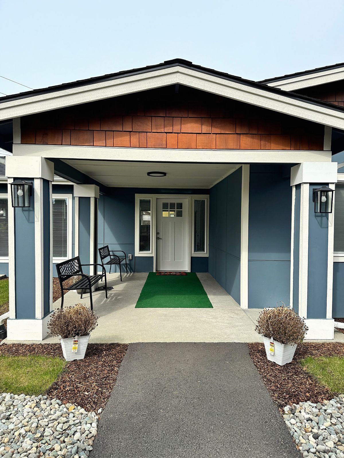 Covered front porch and entrance of the Our Care Solutions home in Everett