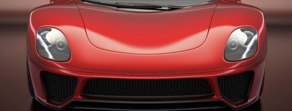 Front of a glossy red sports car