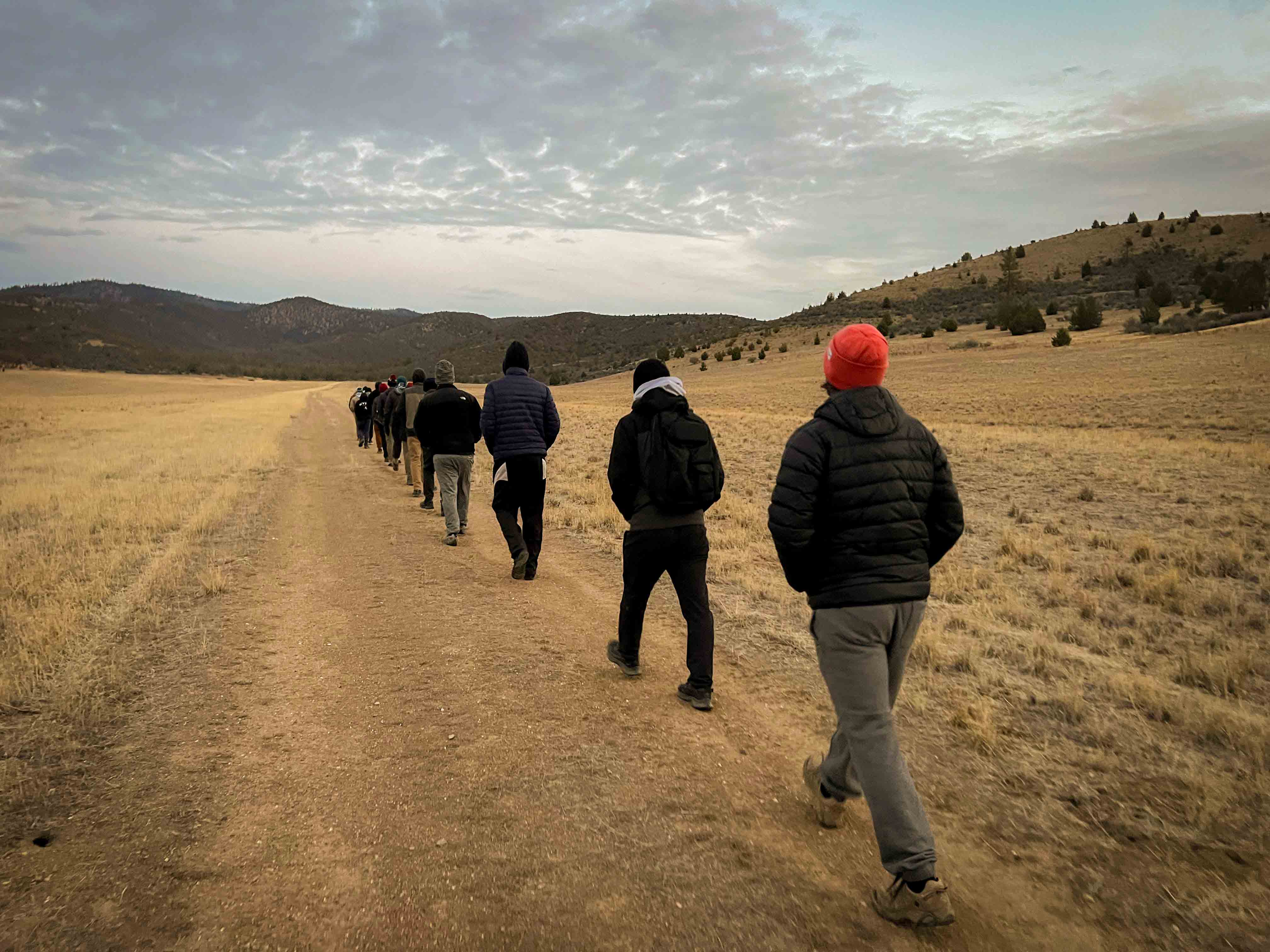 Men walking through Tim's land