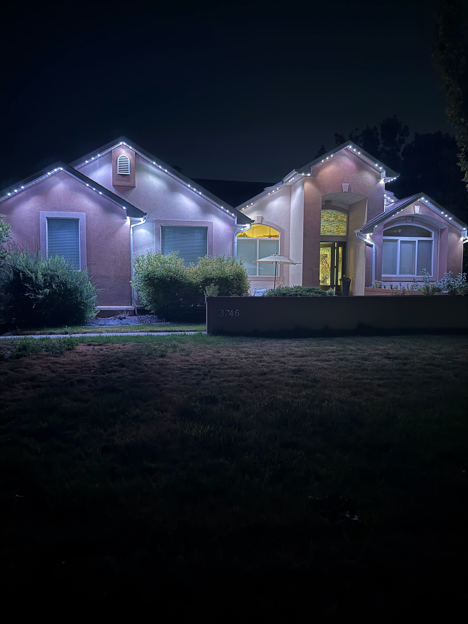Same home at night, lighting fully on