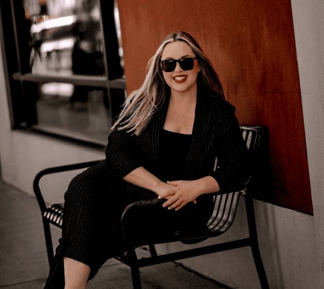 Dr. Kim Thor smiling in sunglasses, representing The Bravery Experience