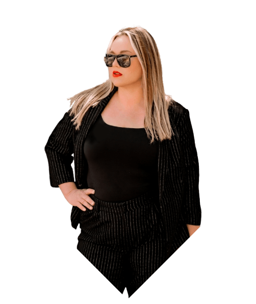 Dr. Kim Thor smiling in sunglasses, upper body rising out of the diamond frame