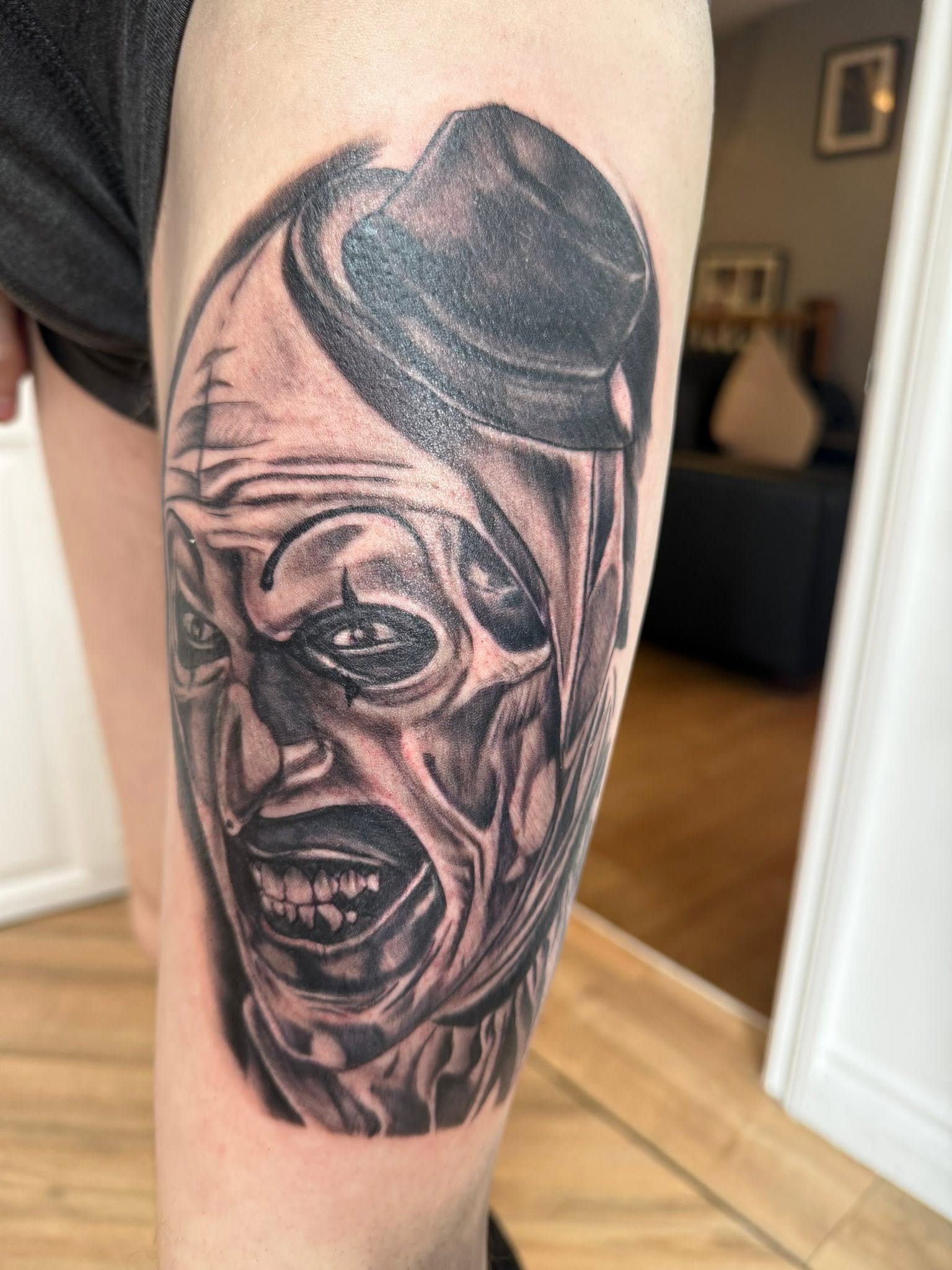Illustrative blackwork tattoo by the Tattoo Phil's team