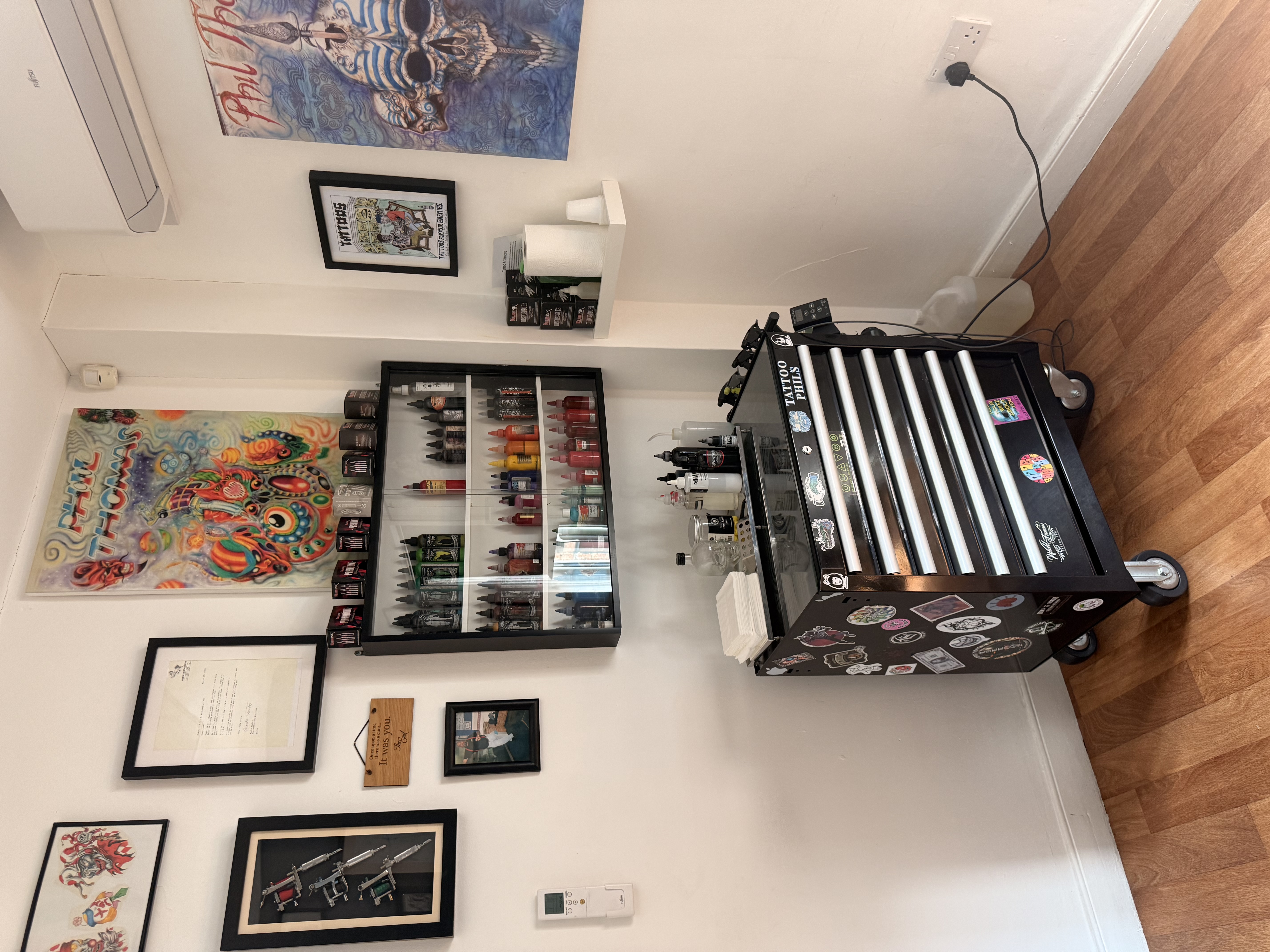 Tattoo equipment station and studio artwork