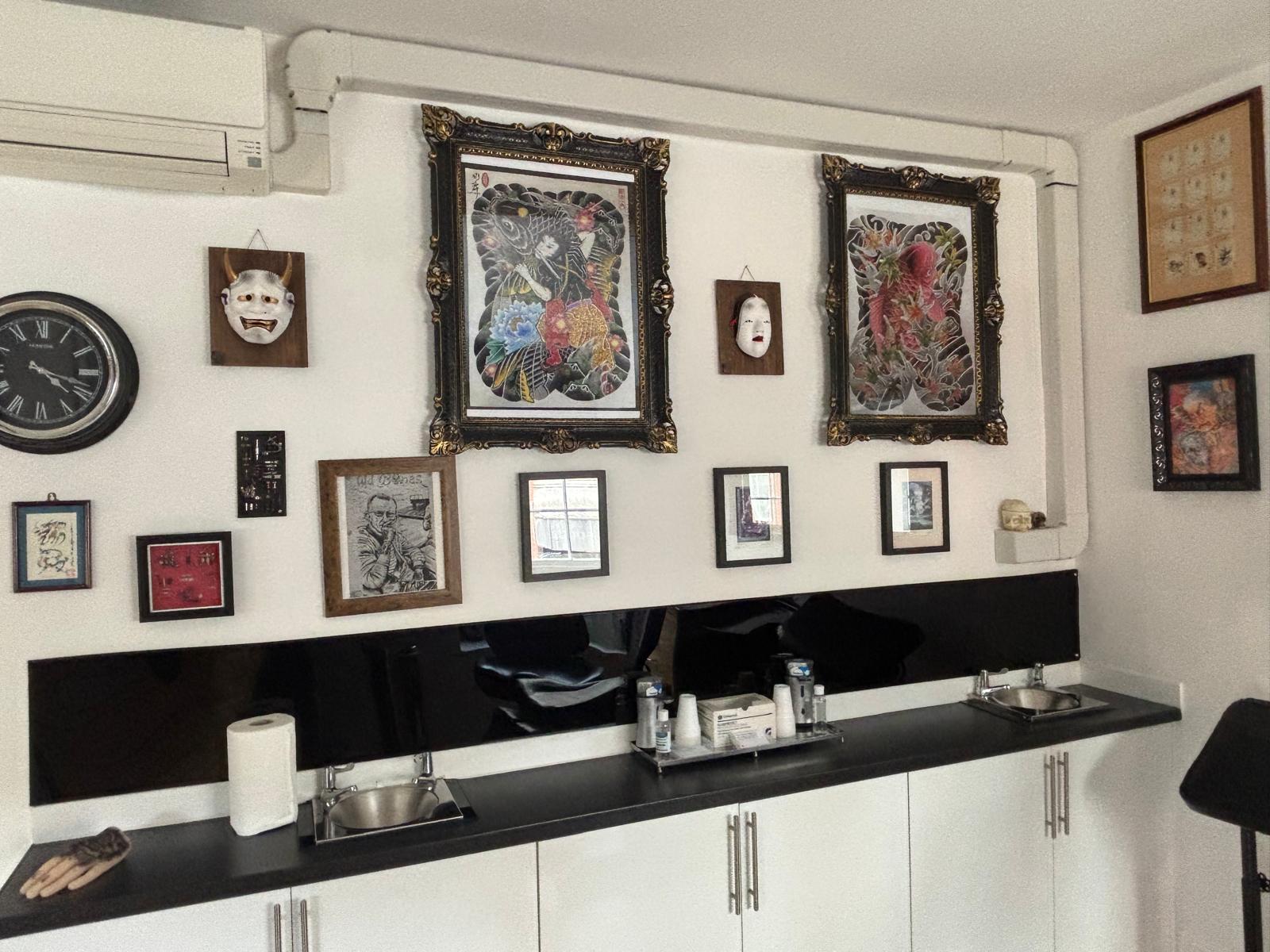 Artwork and preparation area inside Tattoo Phil's