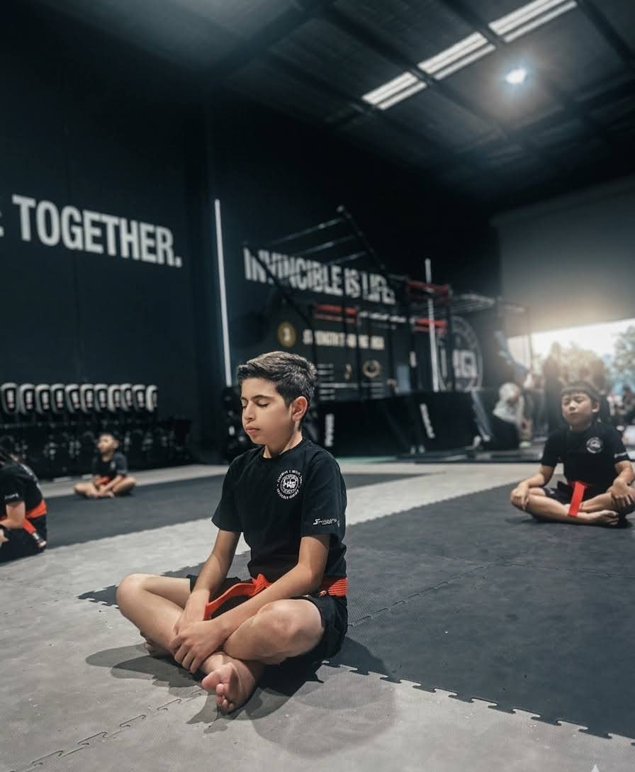 Coach and student at Invincible HQ