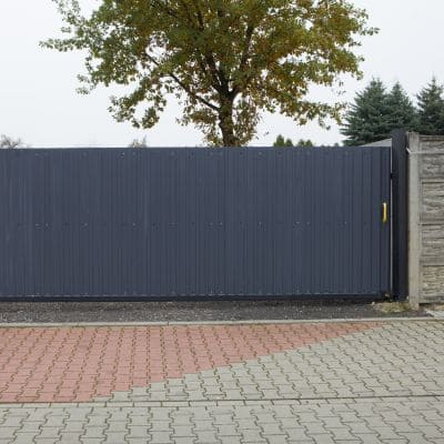 Modern metal sliding gate offering security and style for residential properties