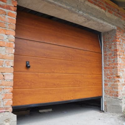 Modern wood garage door with a natural finish