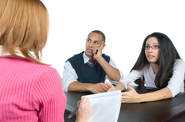 Married business owners discussing LLC ownership and business planning
