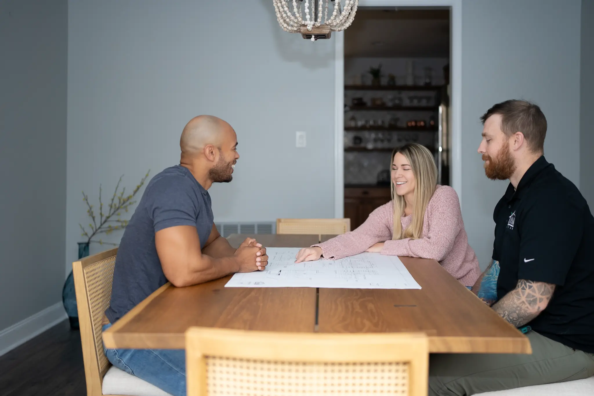 Designer consulting with homeowner