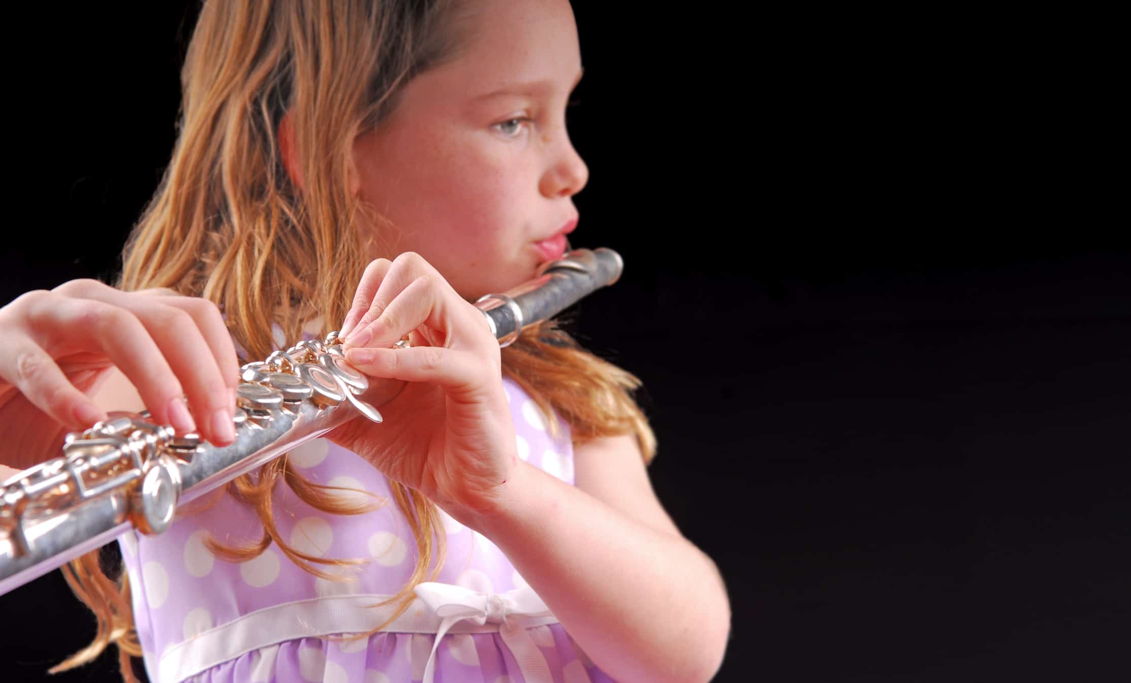student-playing-the-flute