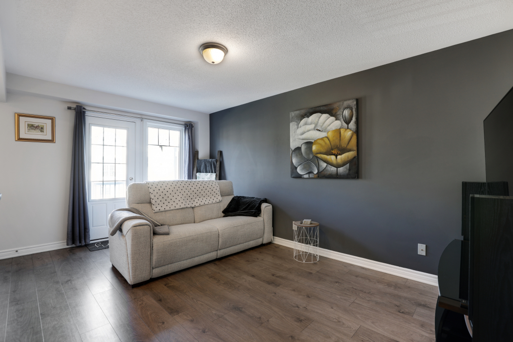 Ottawa home after staging by Romana Kosch — same room transformed