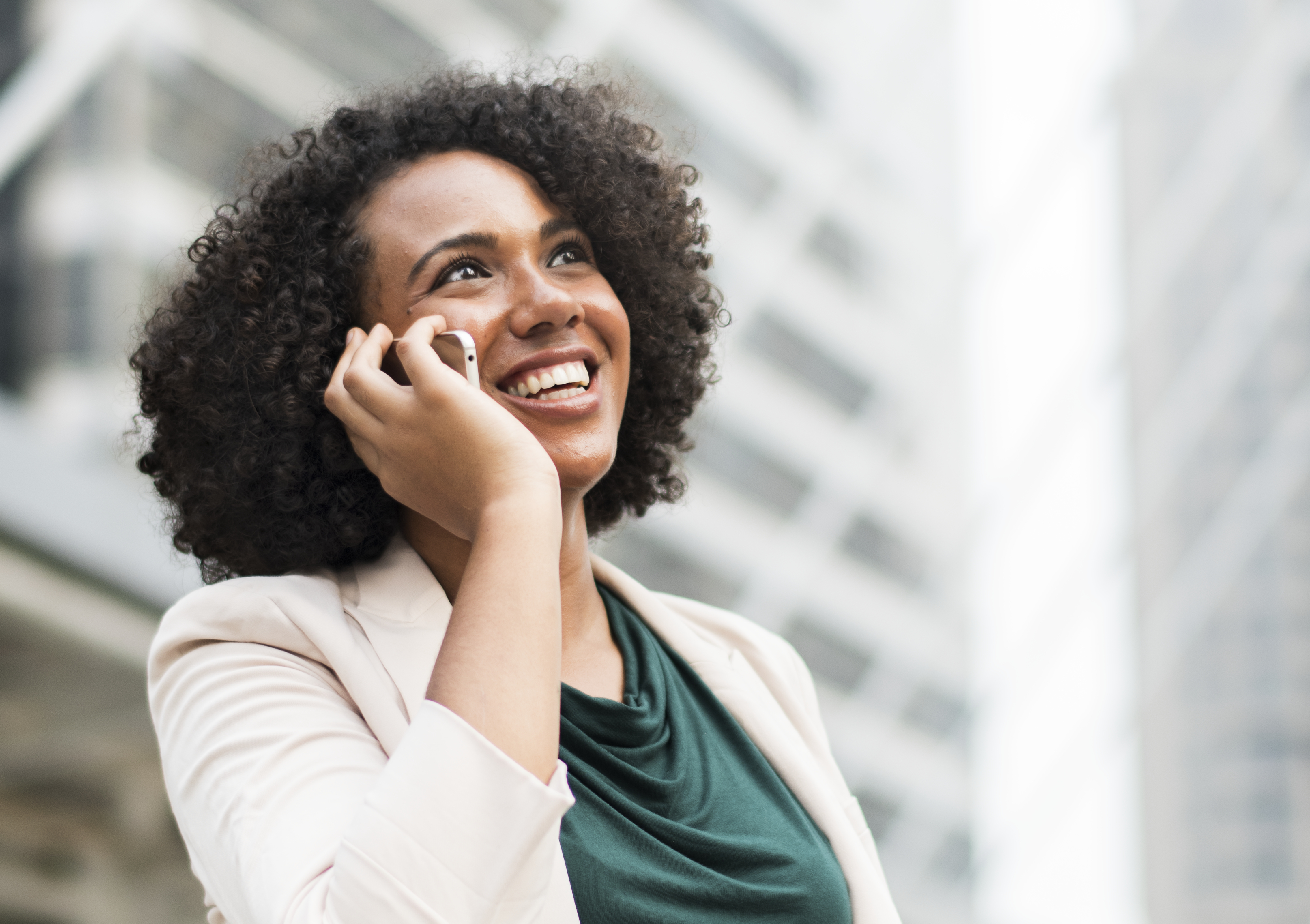 Happy business owner smiling while looking at their website results on screen