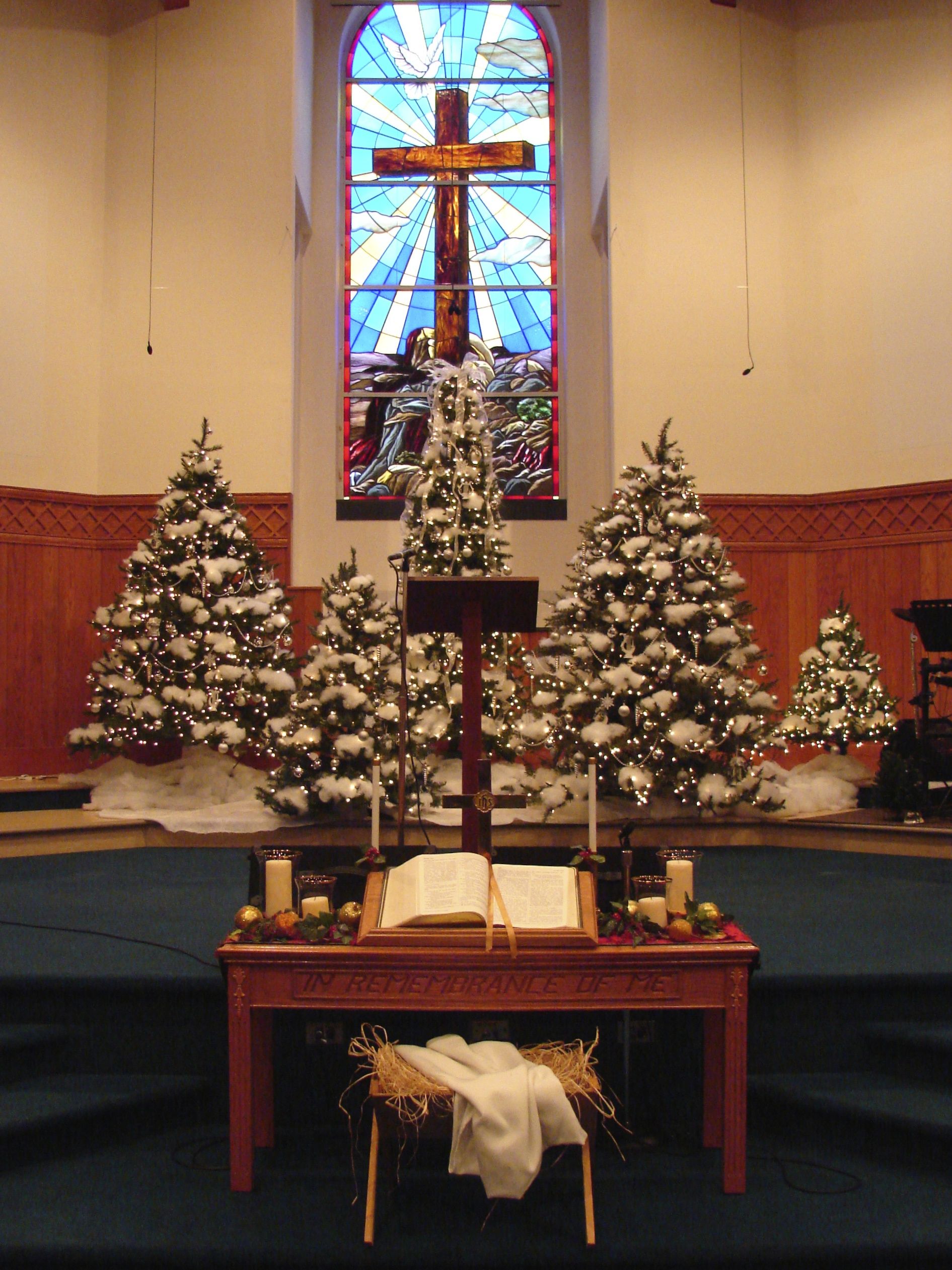 Altar Christmas light setup illuminating sacred space with soft glow and joyful festive spirit for worship.