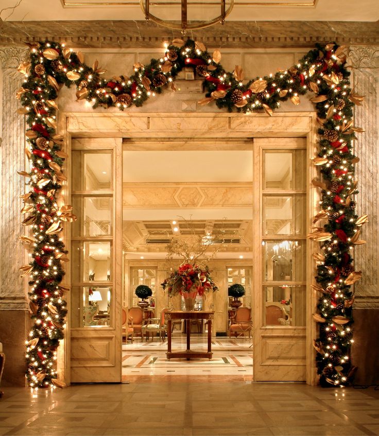 Vibrant hotel Christmas party decorations with sparkling centerpieces, lights, festive tableware, and joyful holiday spirit.