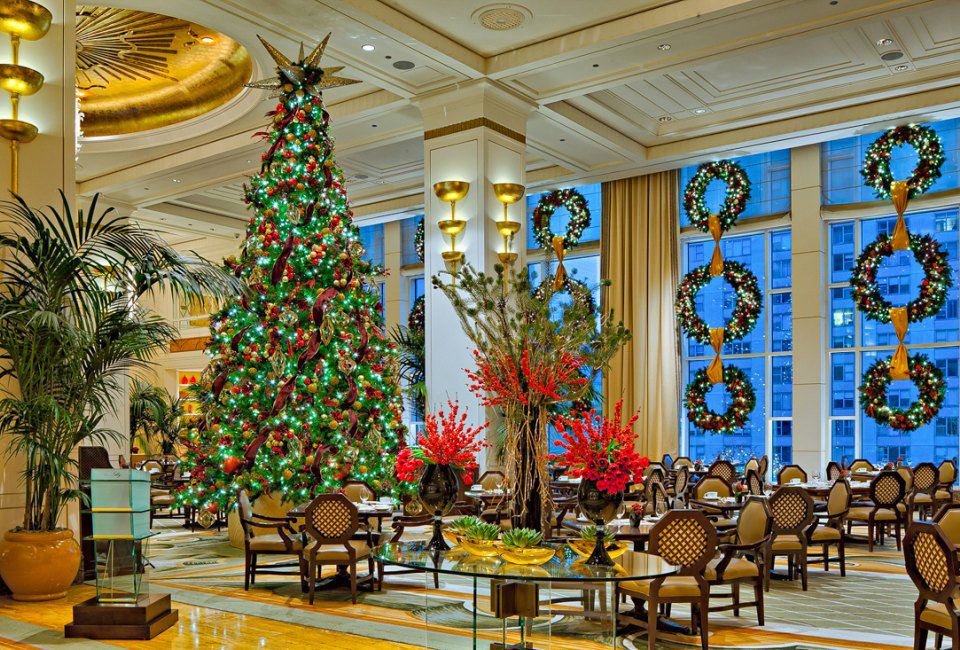 Exquisite luxury hotel Christmas wreaths are handcrafted to add elegance and festive glamour to hotel entrances.