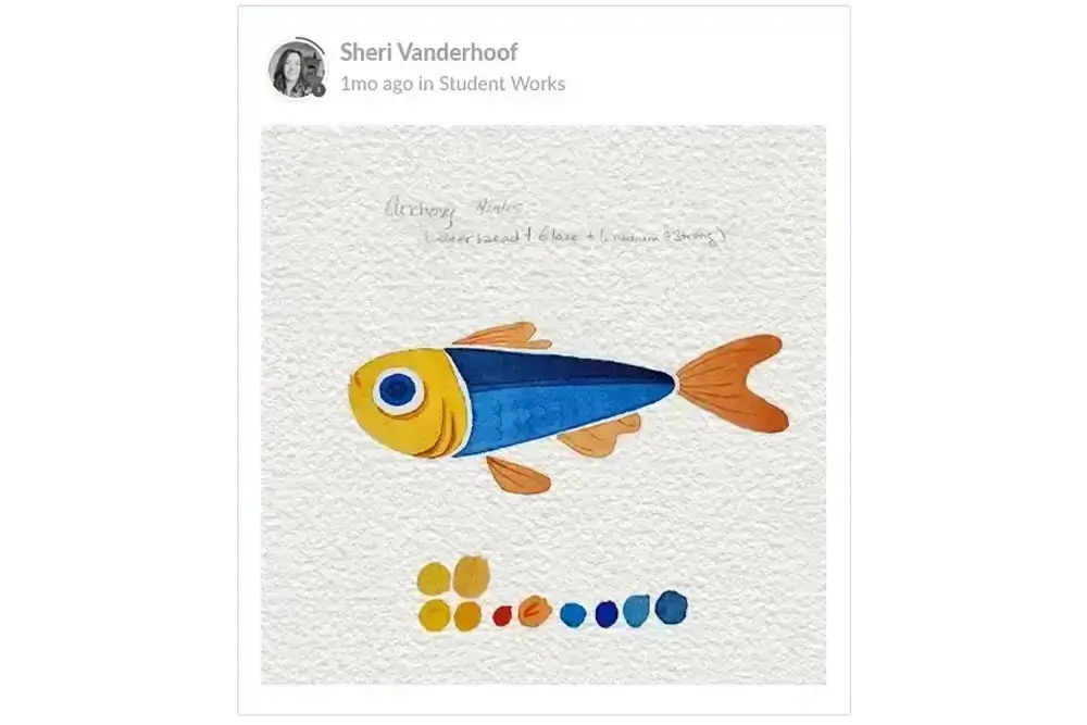 A watercolor painting of a fish with a yellow head, blue body, and orange tail, shown above color swatches of yellow, blue, and orange on textured white paper.