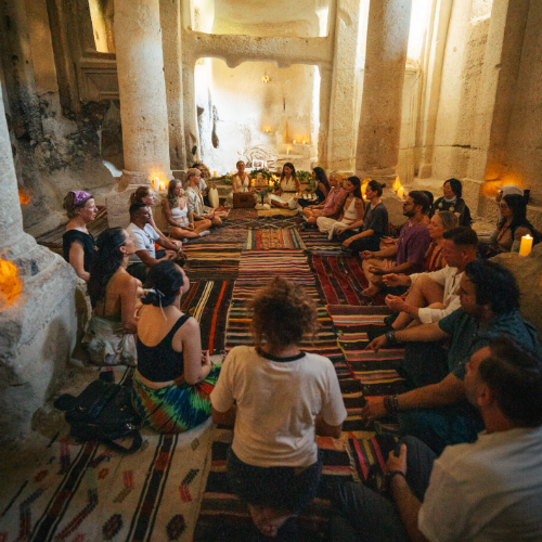 Group healing therapy session with skilled practitioners at consciousness festival Turkey