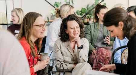 Women chatting at an event