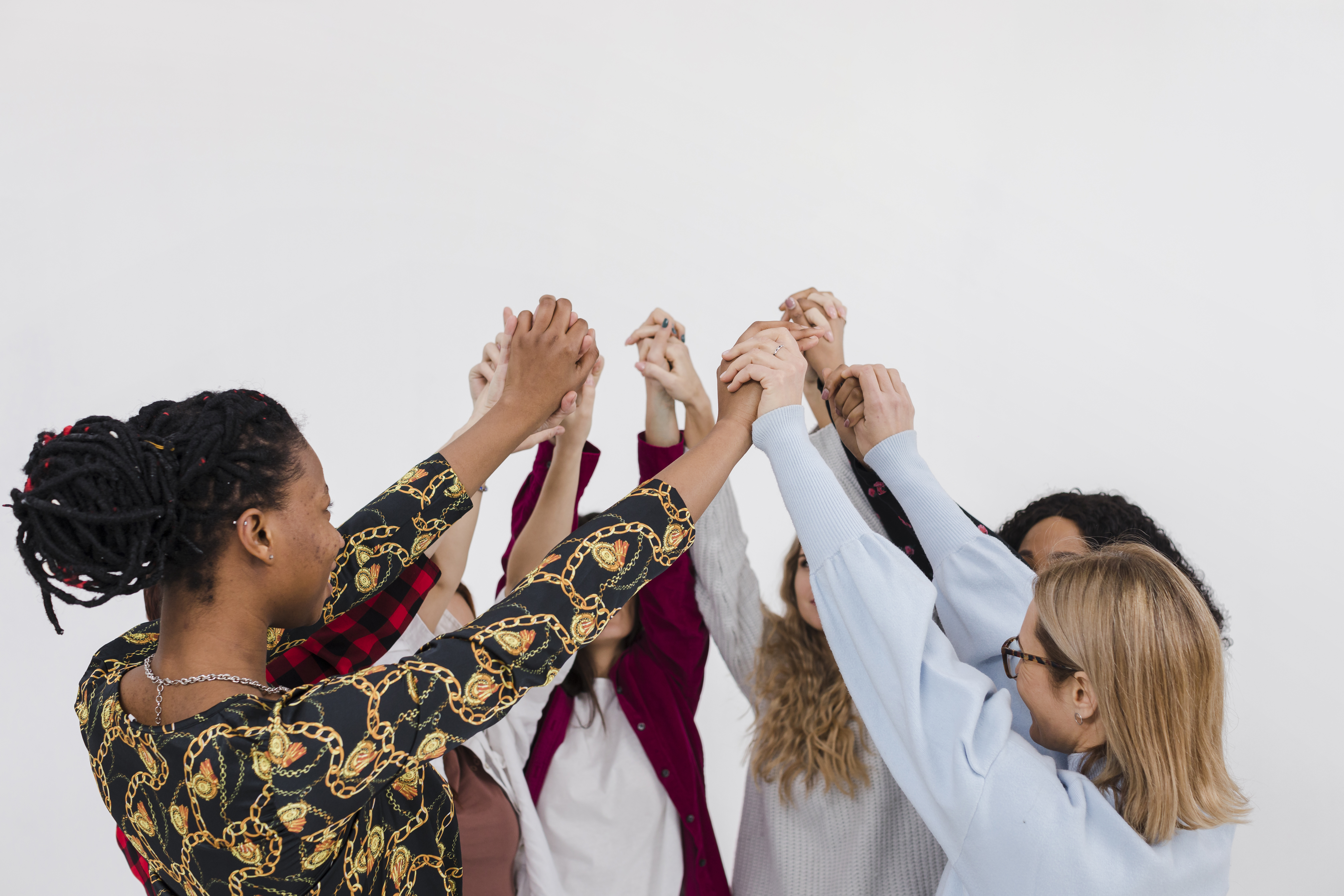 Women lifting their hands up 