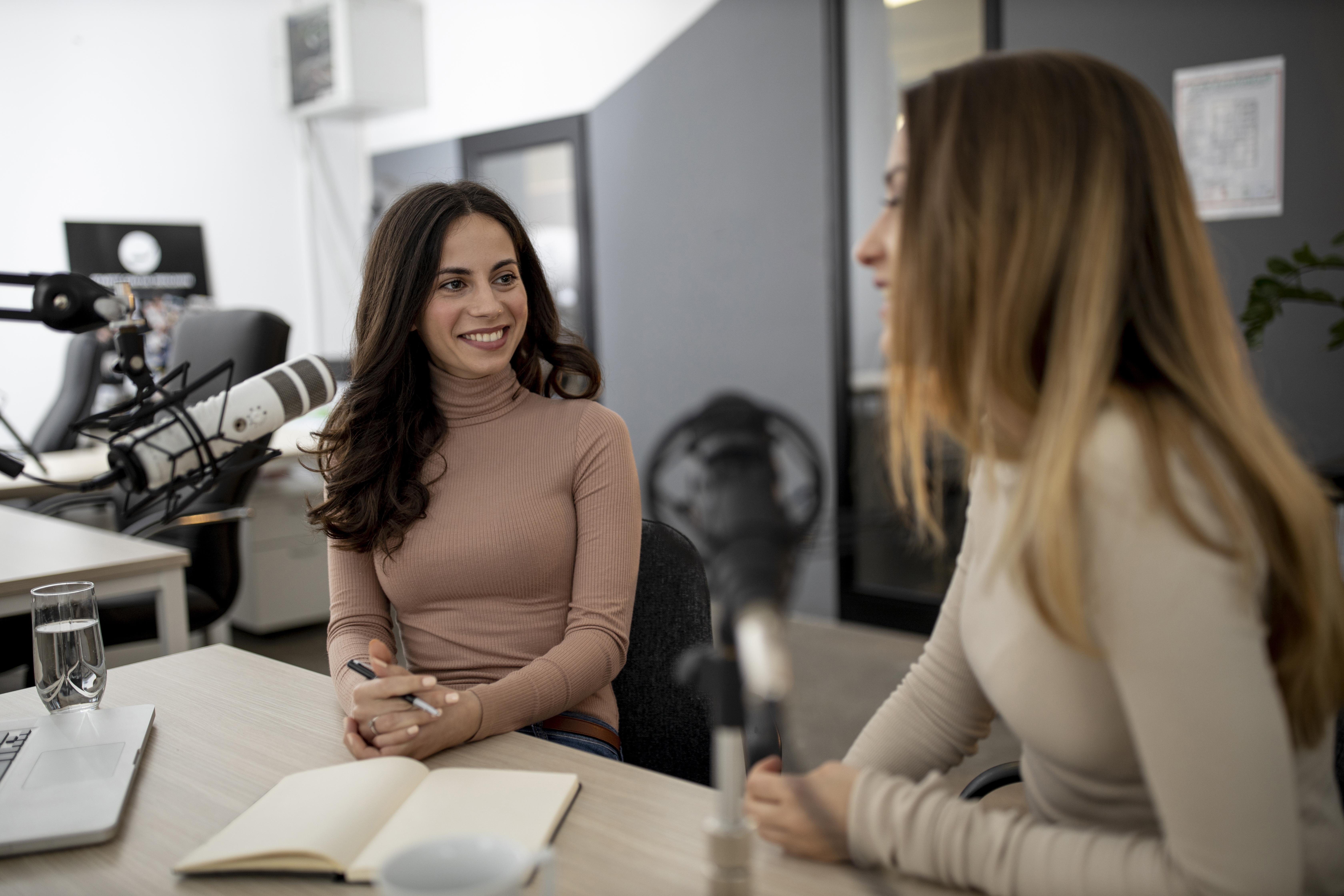 Women recording a podcast