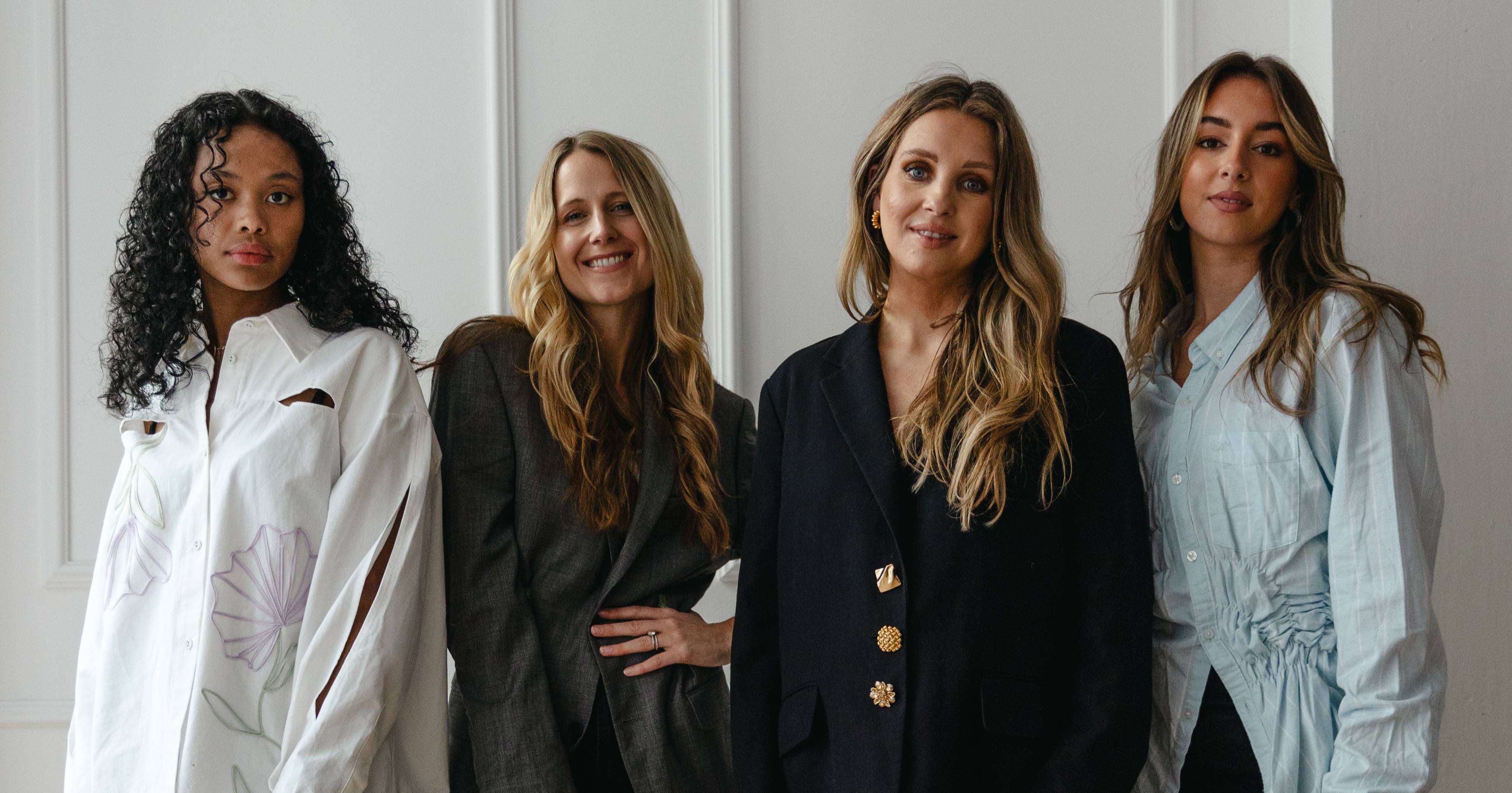 Women lifting their hands up 