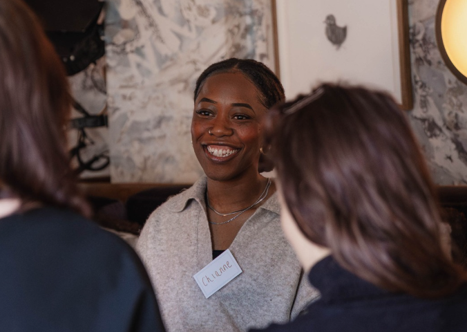 Woman speaking with confidence in a meeting
