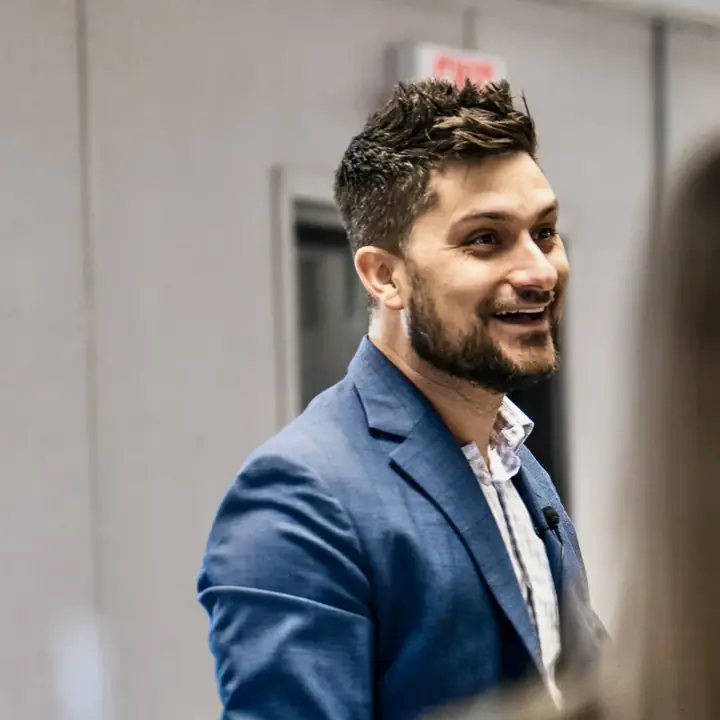 Jordan Sellers speaking to a room of business owners