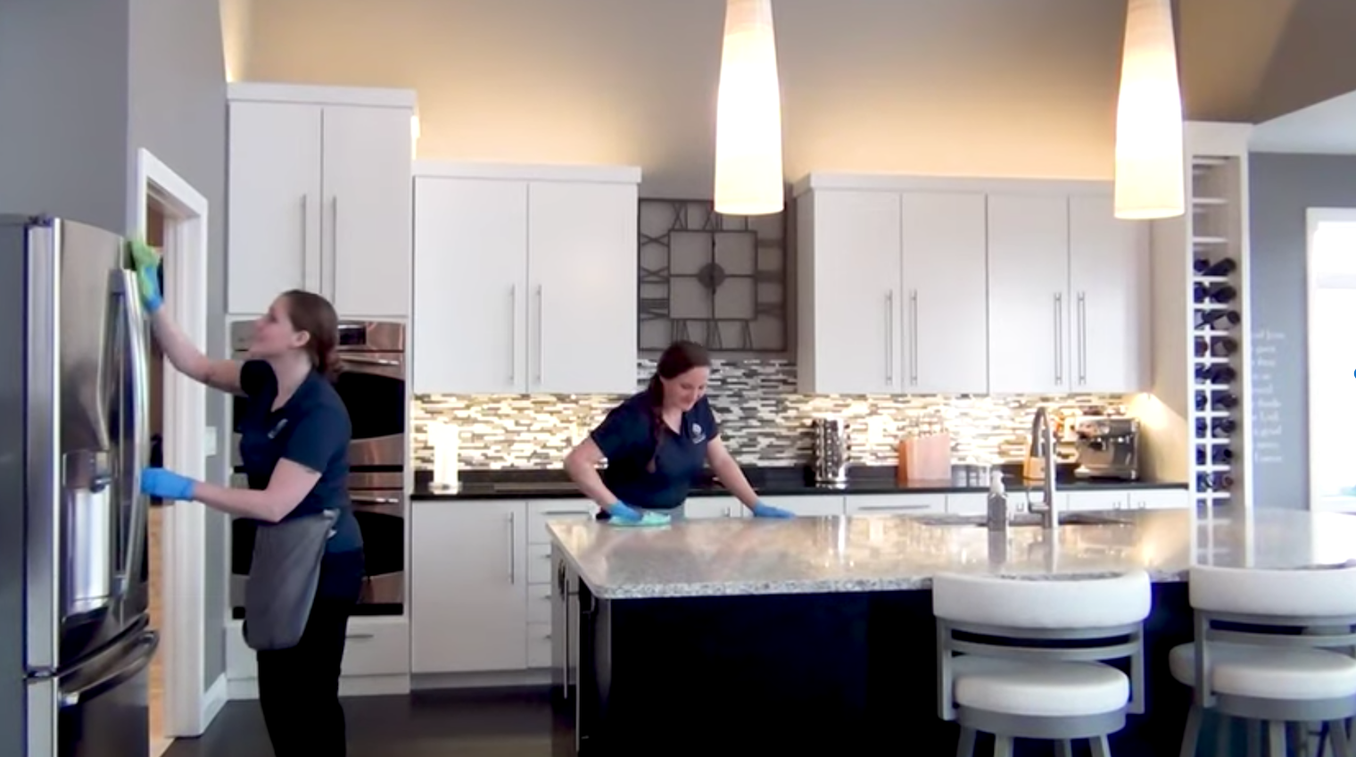 house cleaners cleaning kitchen