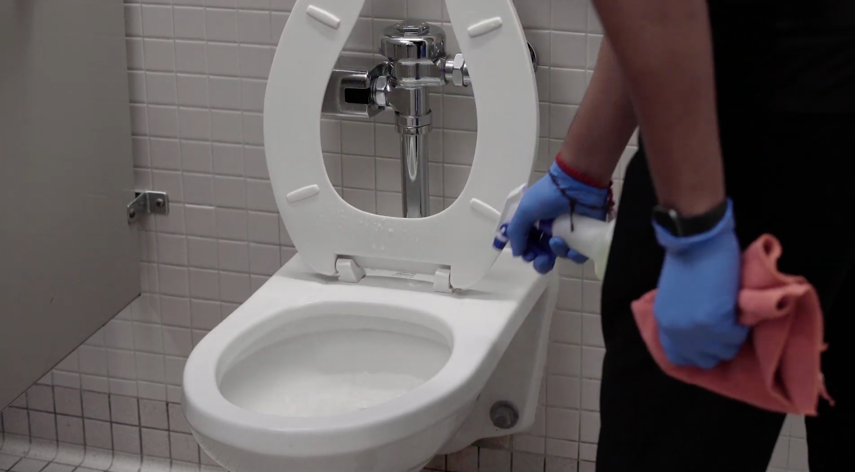 janitor cleaning restroom toilet 