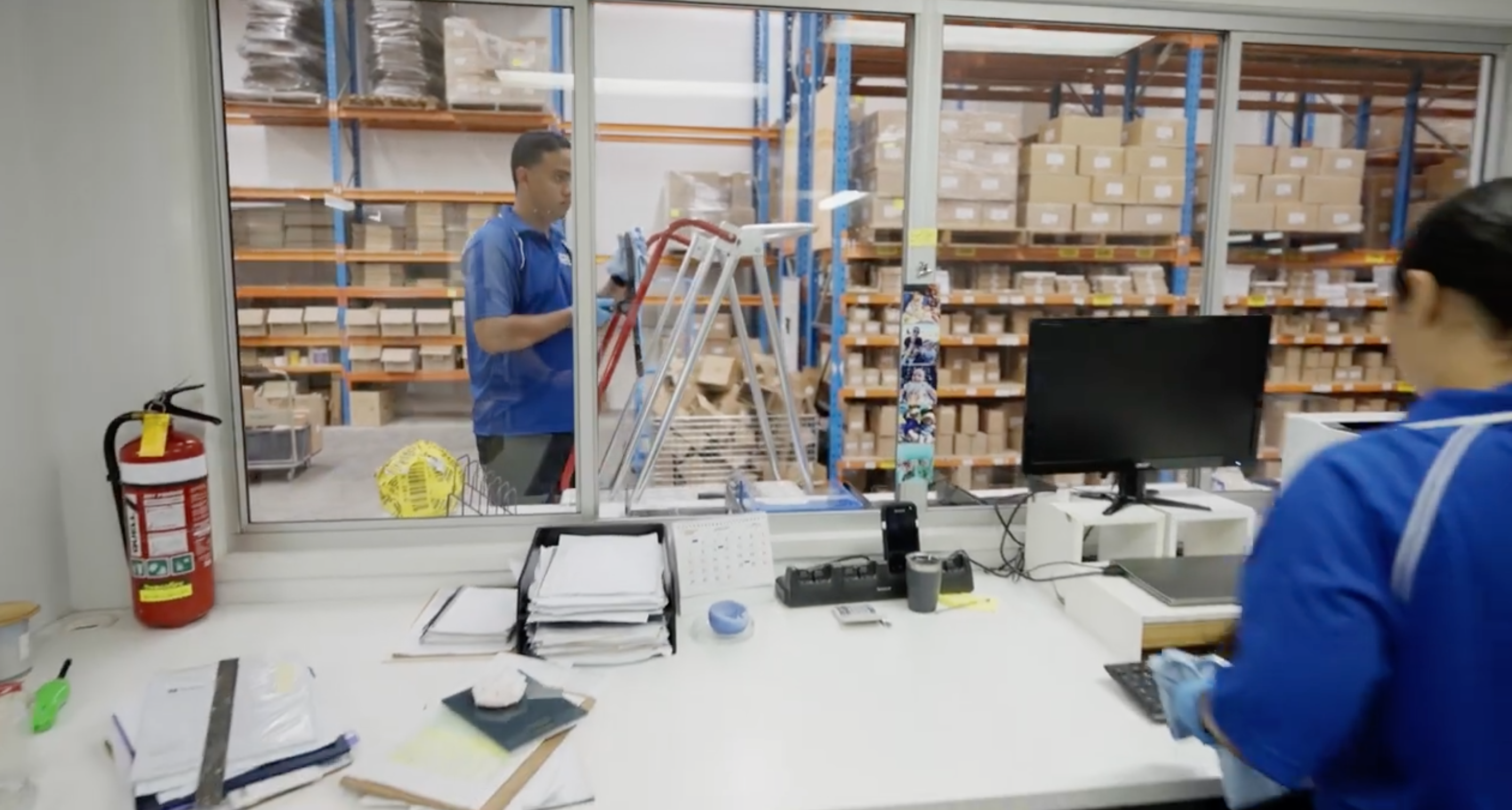 janitor cleaning warehouse