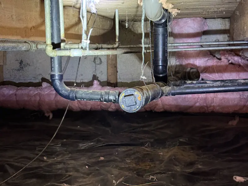 Eastside Repipe And Plumbing technician performing general plumbing repair in Bellevue WA.