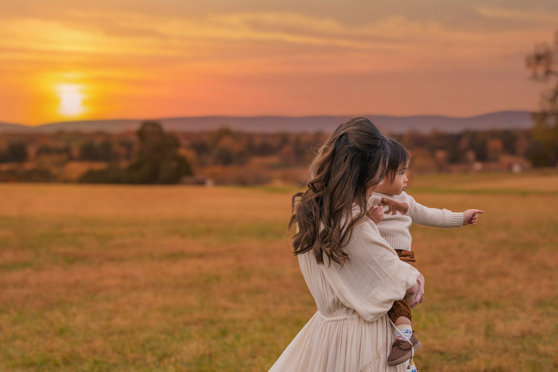 Family portrait in autumn light by BACINI Photography