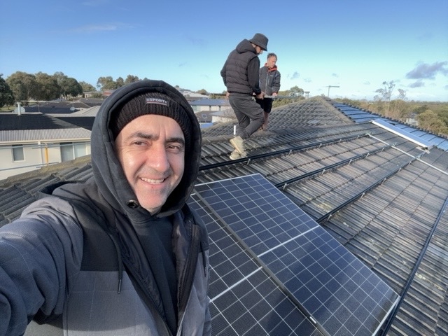 Solar installer on roof