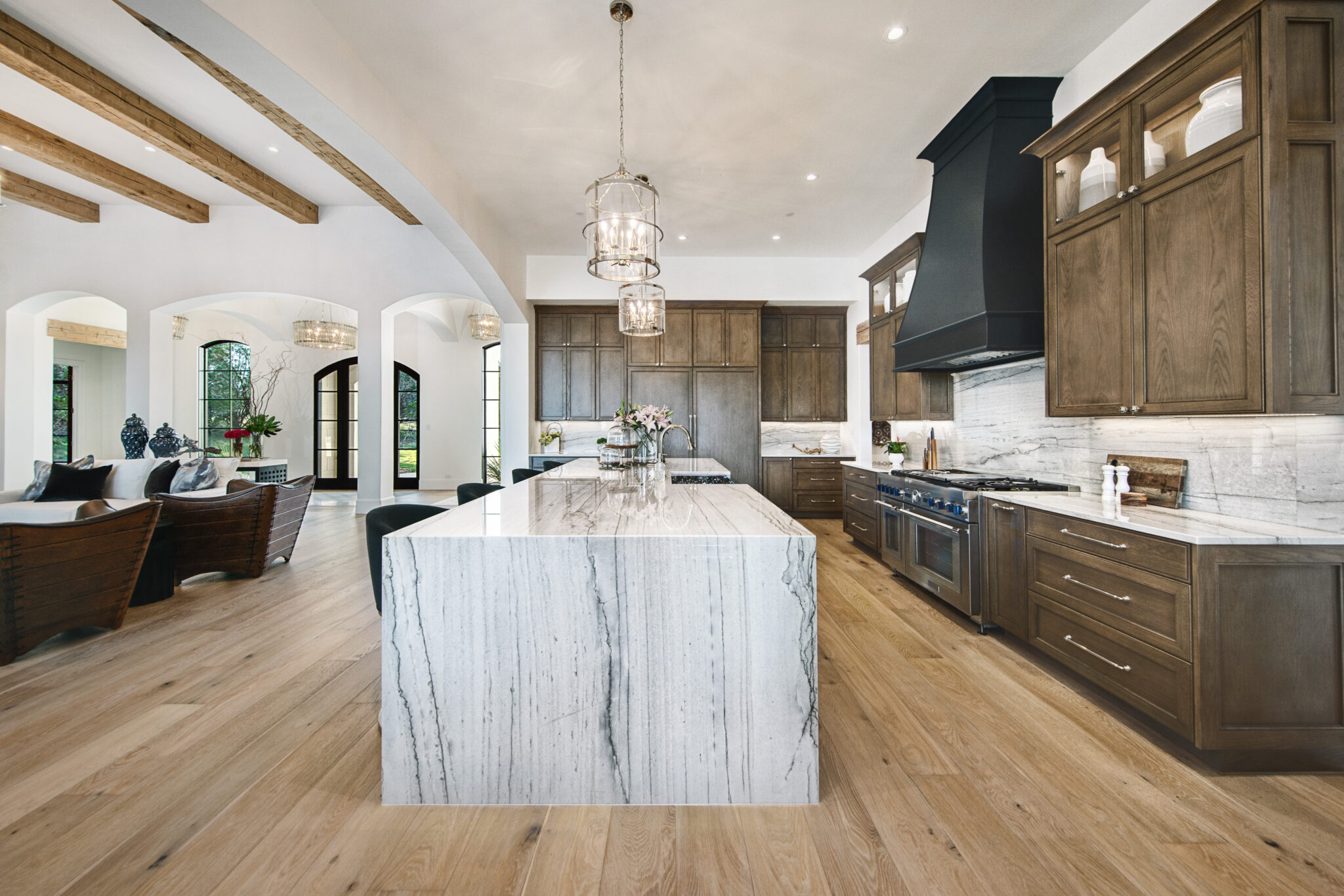 G. Morris custom home kitchen with a waterfall-edge island