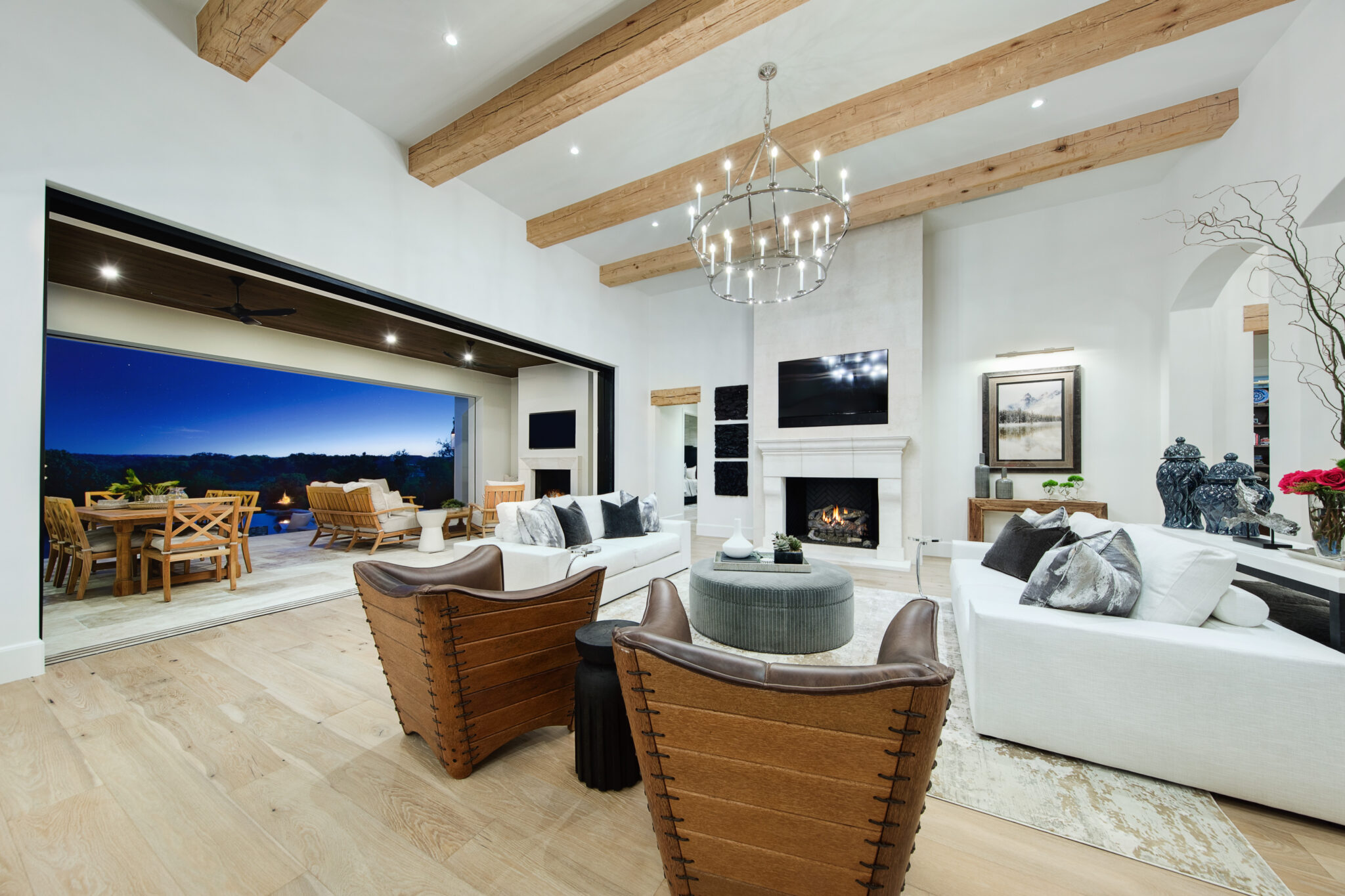 Living room with beamed ceiling and fireplace