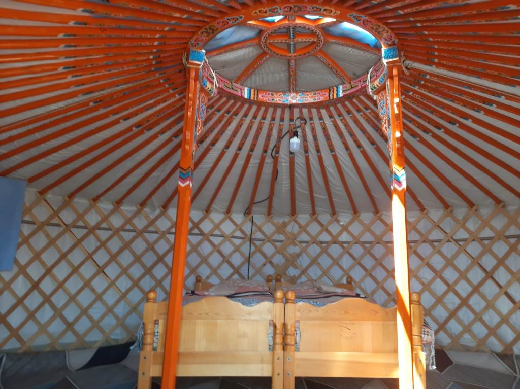 Traditional Mongolian tent under a starry sky