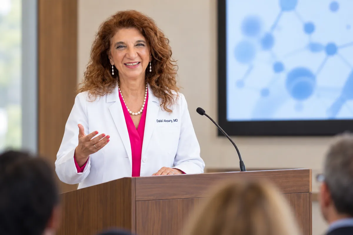 Dr. Dalal Akoury, MD, MPH, integrative physician in Johnson City, Tennessee, speaking at a medical education event