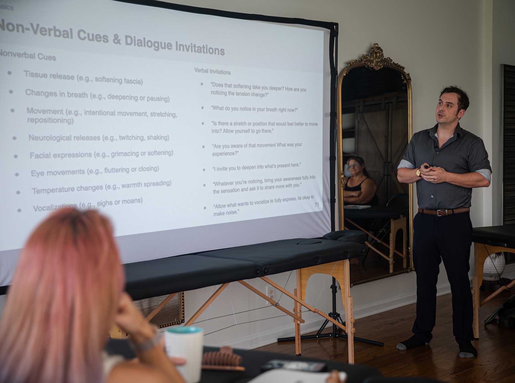 Daniel teaching at the projection screen — somatic principles session
