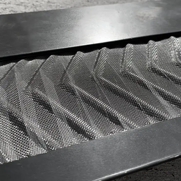 Raised stainless steel micro-mesh gutter guard