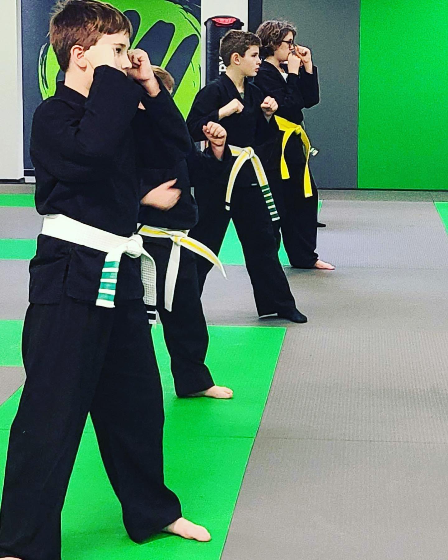 Student practicing a guard stance at Fusion