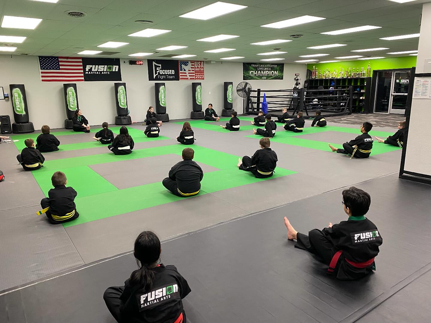 Instructor teaching a kids class at Fusion